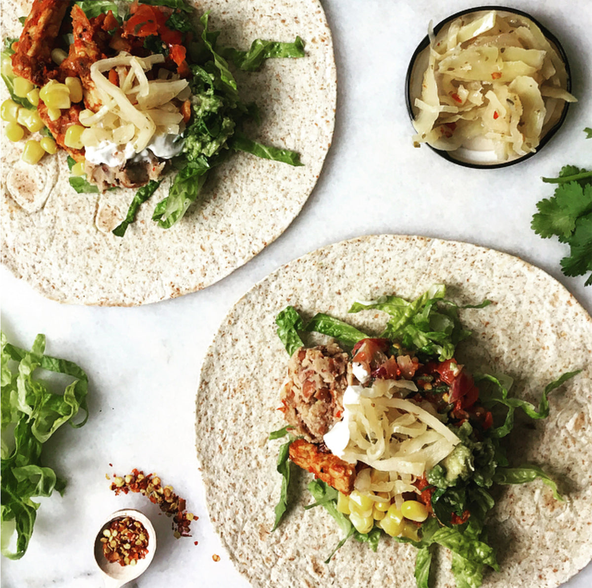 The Culture Collective Sweet & Spicy Vegan Tempeh Tacos with Kraut